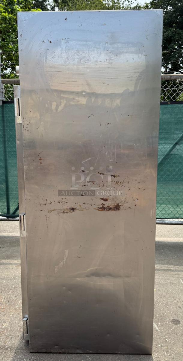 TRAULSEN ART 1-32 36" stainless steel roll-in refrigerator, solid door, used condition with visible surface marks.