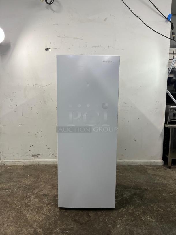 Insignia™ 7 Cu. Ft. Upright Convertible Freezer, model NS-UZ70WH4, in white. Versatile, energy-efficient, minimal wear.