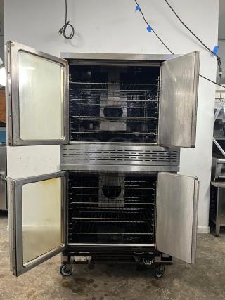 IMPERIAL Double-Deck Convection Oven, steel, high-capacity shelves, wheel base, open doors, used condition, ideal for high-volume use.