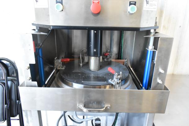AM Manufacturing LT1800BH hot pizza press, metal, commercial, floor style. Condition: Used, 208V, 3 phase. Emergency stop button, press controls visible.