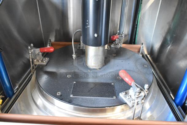 AM Manufacturing LT1800BH metal commercial pizza press, floor style, with red handles. Runs on 208 volts, 3 phase.