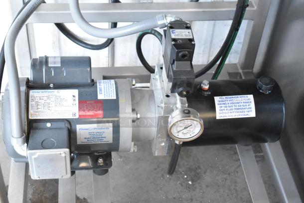 AM Manufacturing LT1800BH hot pizza press, metal, commercial floor style, 208 volts, 3 phase, new condition.