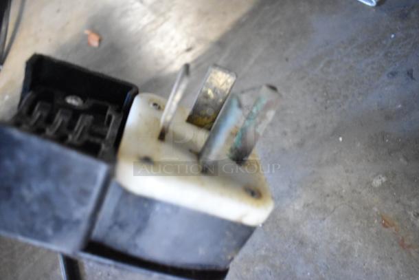 Power plug of the 2018 Autofry MTI-40E ventless fryer. Visible wear on metal prongs. Model designed for 240 Volts, 3 Phase.