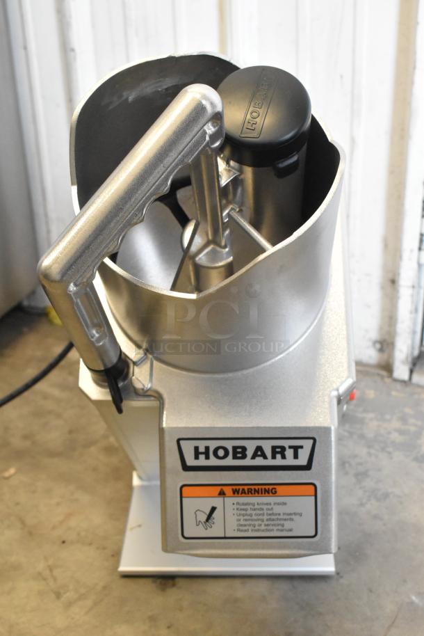 2022 Hobart FP-150 food processor, metal, continuous feed, full moon pusher. Model FP-150, excellent condition, 110-120V.