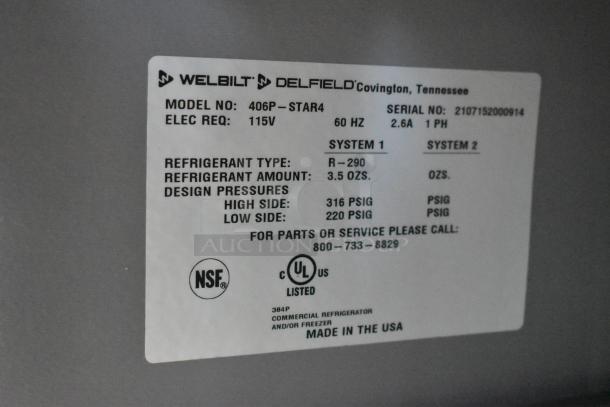 Delfield 406P-STAR4 stainless steel undercounter cooler with label showing model, 115V, R-290 refrigerant, NSF and UL listed.