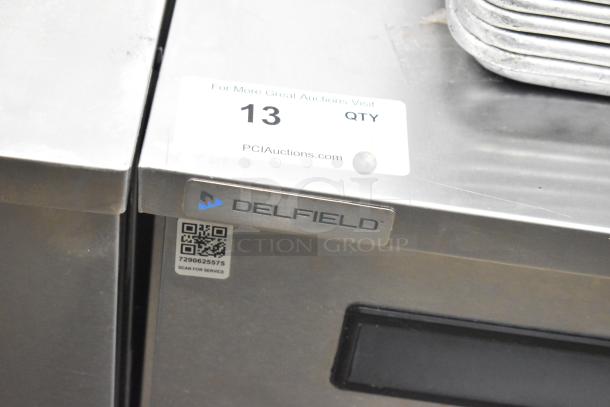2019 Delfield 406P-STAR2 stainless steel undercounter cooler, commercial casters, 115V, 1 phase, Delfield logo visible.
