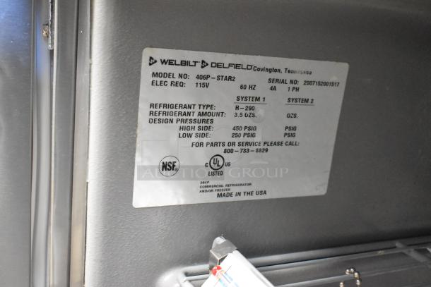 2020 Delfield 406P-STAR2 stainless steel undercounter cooler, 115V, label with model, refrigerant type, and NSF certification.