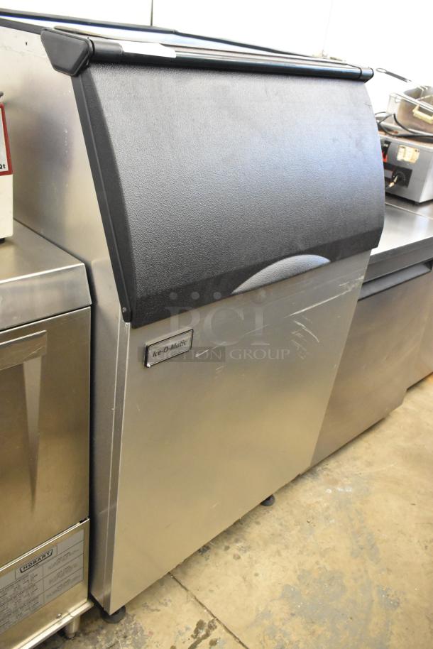 2023 Ice-O-Matic B55PSC stainless steel commercial ice bin, features black top, visible logo, good condition.