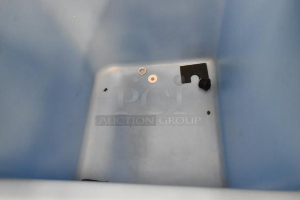 2023 Ice-O-Matic B55PSC stainless steel commercial ice bin interior, clean condition, with hardware fixtures visible.