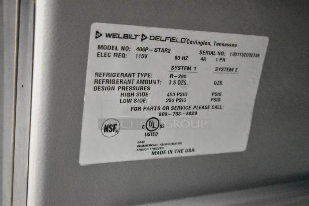 2019 Delfield 406P-STAR2 stainless steel undercounter cooler with label detailing model, electrical requirements, and refrigerant info.
