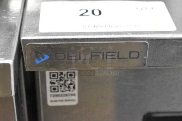 2019 Delfield 406P-STAR2 stainless steel undercounter cooler, commercial casters, 115V, single door.
