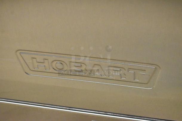 2018 Hobart LXER stainless steel commercial undercounter dishwasher. Features Hobart logo. 120/208-240V, 1 phase.