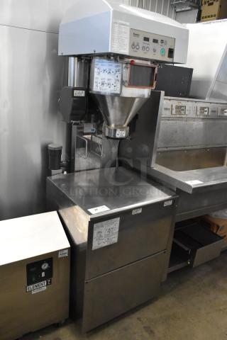 Ricemini RM-401AG metal commercial rice washing machine, 100V, 1 phase, features labels with instructions, and operational controls.