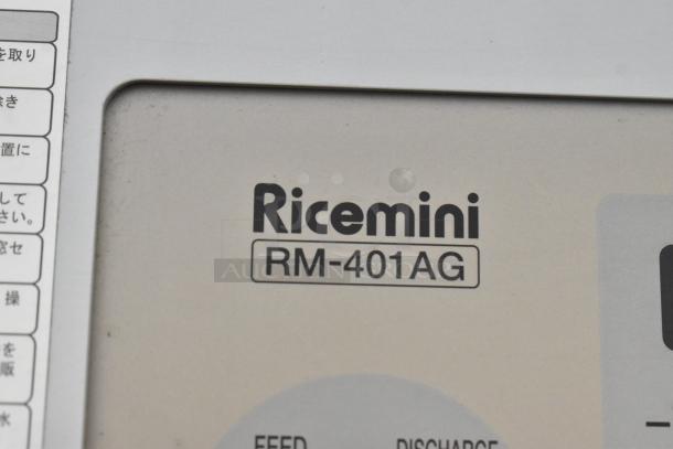 Ricemini RM-401AG Metal Commercial Rice Washer, 100 Volts, 1 Phase. Visible label showing brand and model details.