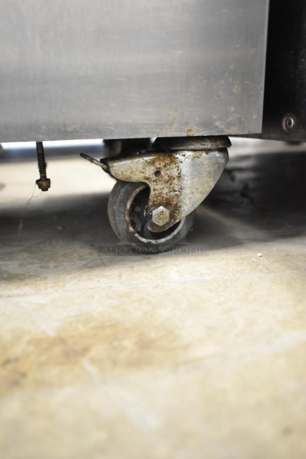 2018 Jun-Air 87R-4MN1-HSBHH stainless steel nitrogen generator on commercial casters. Visible wear on wheel, 120V.