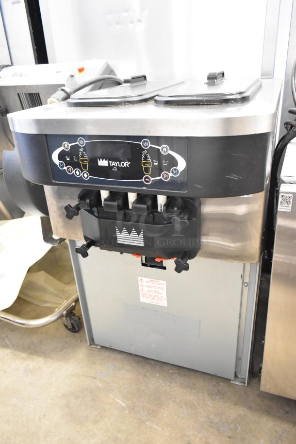 Taylor C723-27 stainless steel soft serve ice cream machine, 2 flavor with twist, countertop, water cooled, 208-230V.