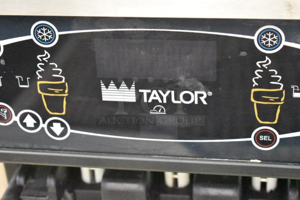 Taylor C723-27 stainless steel soft serve machine, 2 flavors with twist, water cooled, 208-230V, 1 phase, commercial use.