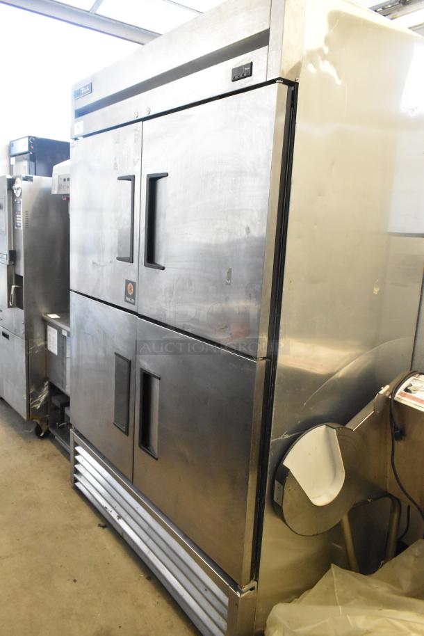 2017 True T-49F-4-HC stainless steel commercial freezer with 4 half-size doors. 115 volts, 1 phase. Visible wear.
