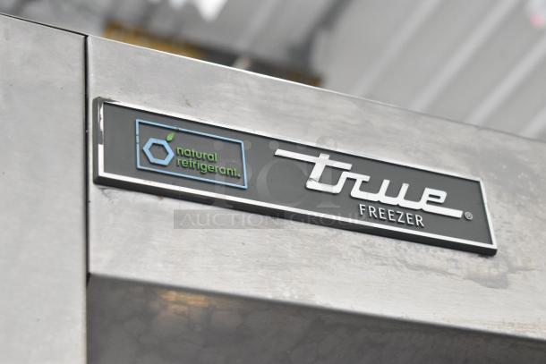 2017 True T-49F-4-HC stainless steel freezer with 4 half-size doors, natural refrigerant label visible.