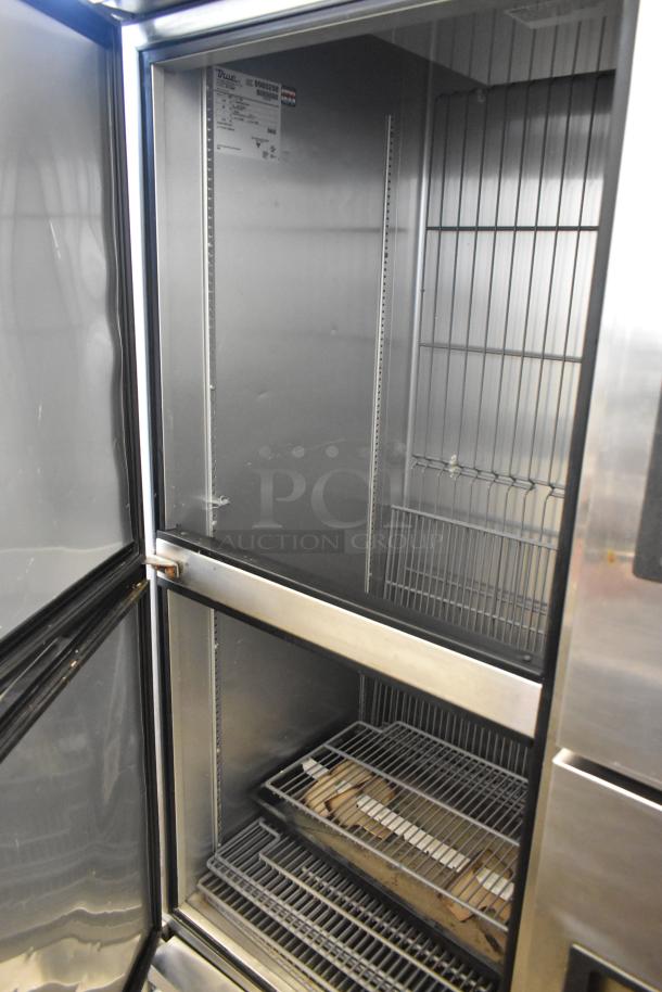2017 True T-49F-4-HC stainless steel commercial freezer, 4 half-size doors, 115V, 1 Phase, interior shelves.