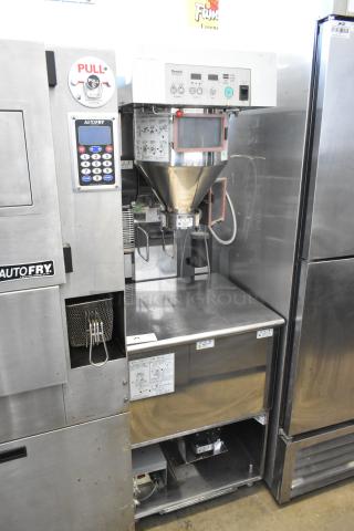 Ricemini RM-401AG Metal Commercial Rice Washing Machine, 100V, 1 Phase, featuring control panel and labels, in used condition.