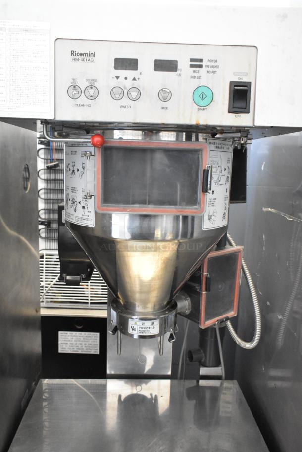 Ricemini RM-401AG metal rice washing machine, floor style, 100V, 1 phase. Features controls for water, rice, and cleaning.