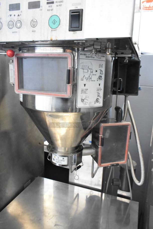 Ricemini RM-401AG rice washing machine, metal, floor style, 100V, 1-phase. Visible control panel and instruction labels.