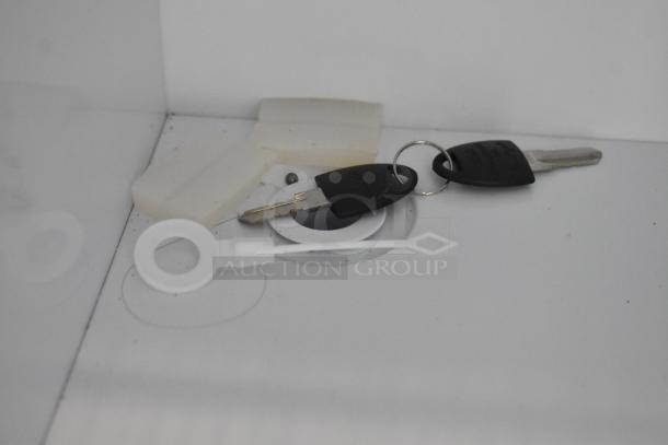 KoolMore KM-MDR-17S reach-in cooler accessories: keys, plastic tie, and packing materials. Brand new, minor scratches and dents.