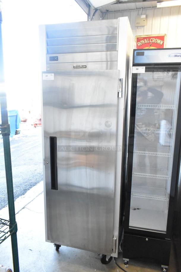 2022 Traulsen SB1G-10010-032A stainless steel single door cooler with poly coated racks and commercial casters, 115V, 1 phase.
