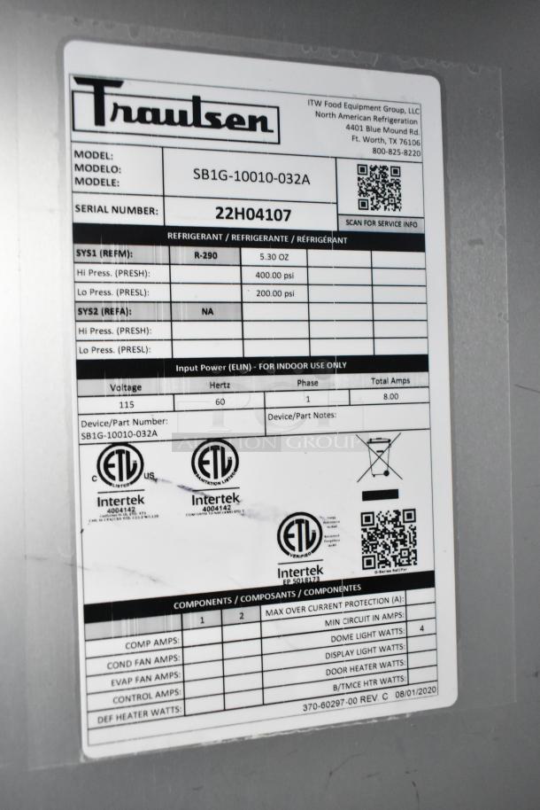 2022 Traulsen SB1G-10010-032A stainless steel single door reach-in cooler, poly coated racks, commercial casters, 115V, 1 phase.