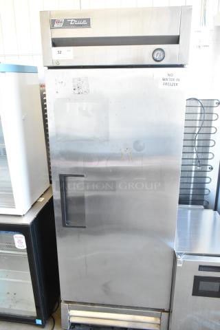 2017 True T-19F stainless steel commercial single door reach-in freezer with poly-coated racks; 115V, 1 phase. Visible wear.