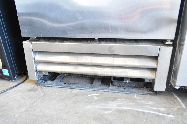 2017 True T-19F stainless steel commercial single door reach-in freezer with poly coated racks, 115 volts, 1 phase.