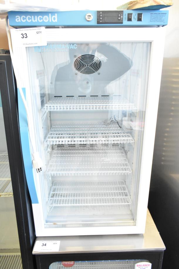 Accucold ARG3PV Mini Cooler Merchandiser, features poly-coated racks, glass door, 115 volts, well-maintained condition.