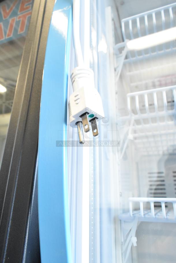 Accucold ARG3PV Mini Cooler Merchandiser with poly-coated racks, 115 volts, phase plug, in excellent condition.