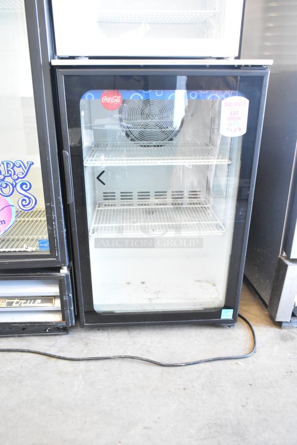 Imbera EVC04 Mini Cooler Merchandiser with poly coated racks, 115 volts, phase, branded decals visible, in good condition.