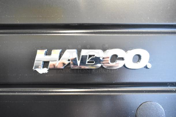 2019 Habco SE18 metal single door reach-in cooler with poly-coated racks, showing Habco logo on front, black finish.