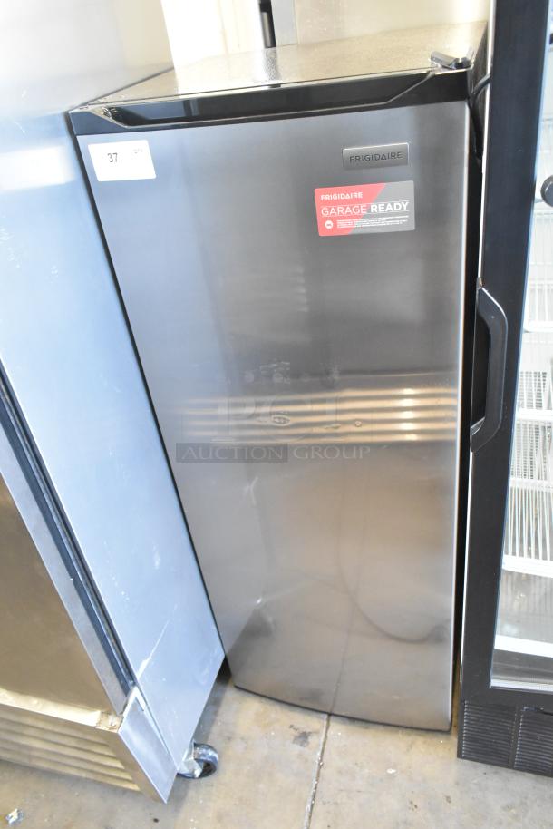 Frigidaire EFRF698-6COM stainless steel reach-in freezer, single door, labeled "Garage Ready," 115V, 1 phase.
