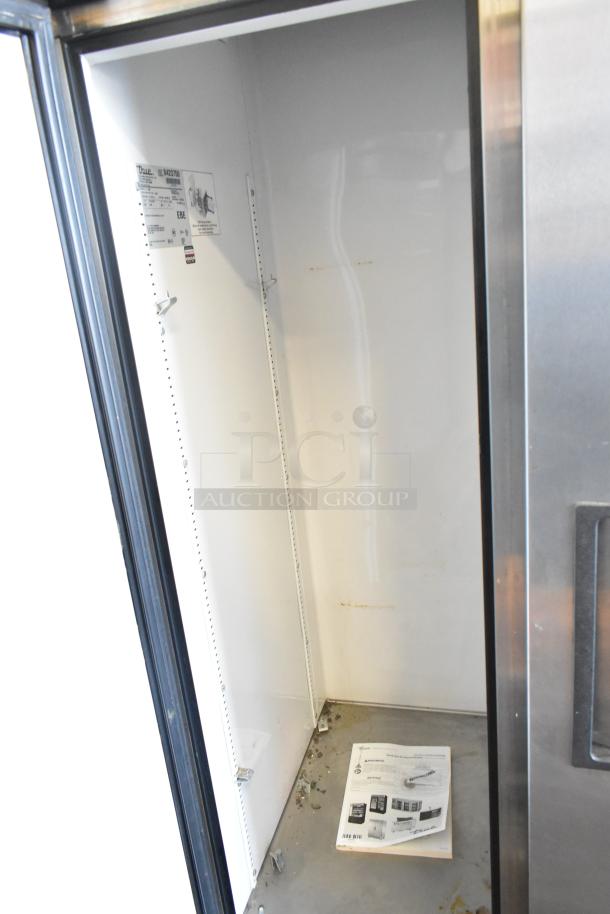 True T-35 stainless steel two-door reach-in cooler, visible interior, poly-coated racks, commercial casters, 115V, 1 phase.