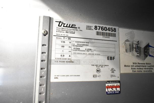 2016 True T-35 stainless steel commercial 2-door reach-in cooler label with model, voltage, and refrigerant details.