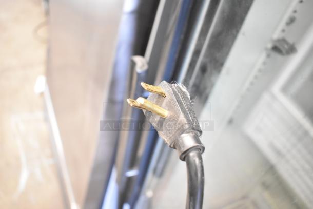 True GDM-12 cooler plug, 115 volts, 1 phase, metal single door reach-in merchandiser.