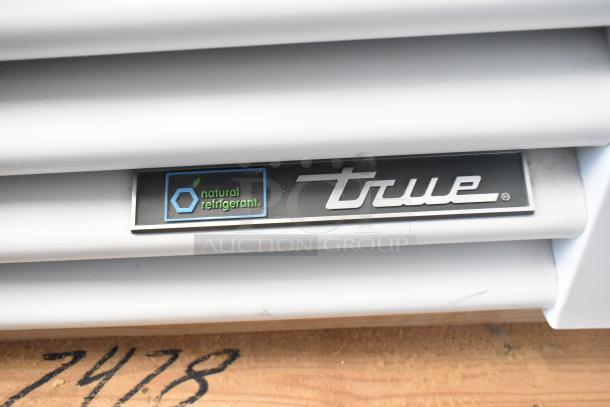 2023 True TSCI-600R-G-PH cooler badge, featuring "natural refrigerant" label.