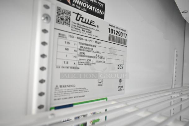2023 True TSCI-600R-G-PH commercial cooler label showing model, 115V, 1 Phase, R290 refrigerant; includes poly-coated racks.