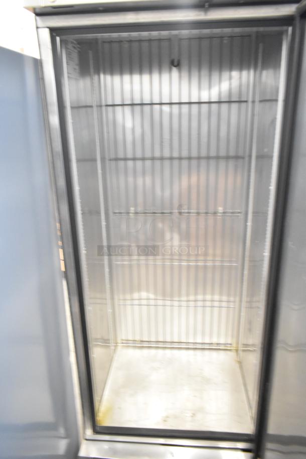 2016 True T-19F stainless steel single door commercial freezer, 115 volts, excellent interior condition, includes shelves.