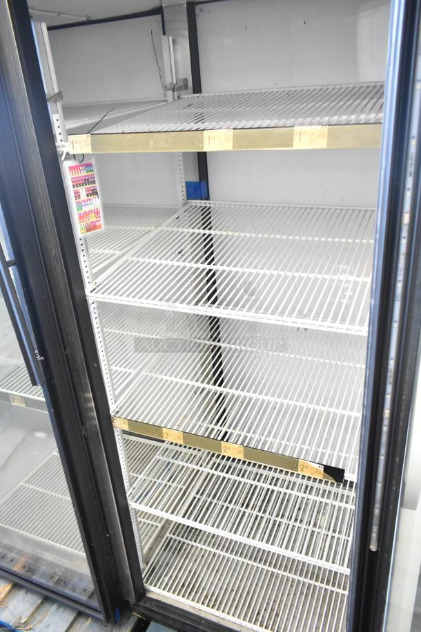 True GDM-52TM-RL-LD 2 Door Reach In Cooler Merchandiser, metal, poly-coated racks, 115 volts, 1 phase.