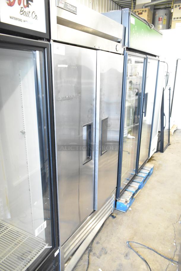 2017 True T-35 stainless steel commercial 2-door reach-in cooler with poly coated racks. 115 volts, 1 phase.