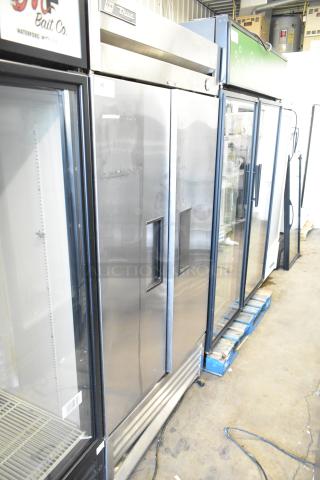 2017 True T-35 stainless steel commercial 2-door reach-in cooler with poly coated racks. 115 volts, 1 phase.