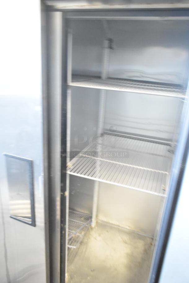 2017 True T-35 reach-in cooler, stainless steel, 2 doors, poly-coated racks, 115V, 1 phase, commercial use, clean interior.
