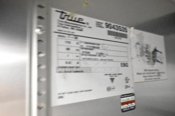 2017 True T-35 2 Door Cooler, stainless steel, poly coated racks, 115V, 1 phase. Model label detail, serial and voltage info shown.