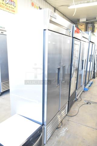 2016 True T-35 stainless steel commercial 2-door reach-in cooler, poly-coated racks, commercial casters, 115V, 1 phase.