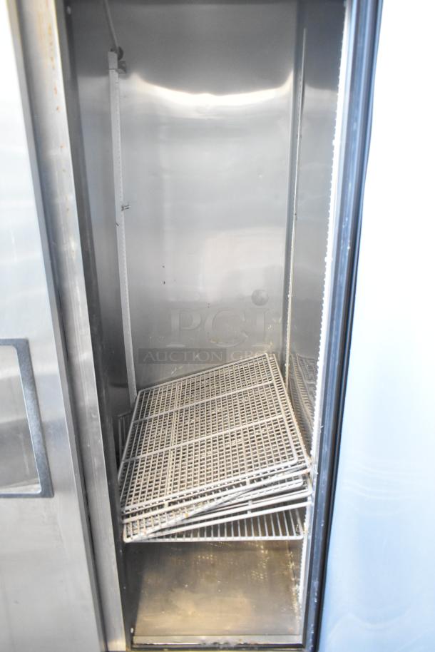 True T-35 stainless steel commercial 2-door cooler with poly coated racks. Features casters and operates on 115 volts, 1 phase.